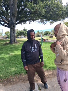 Customer wearing Banks Legendary Fashions